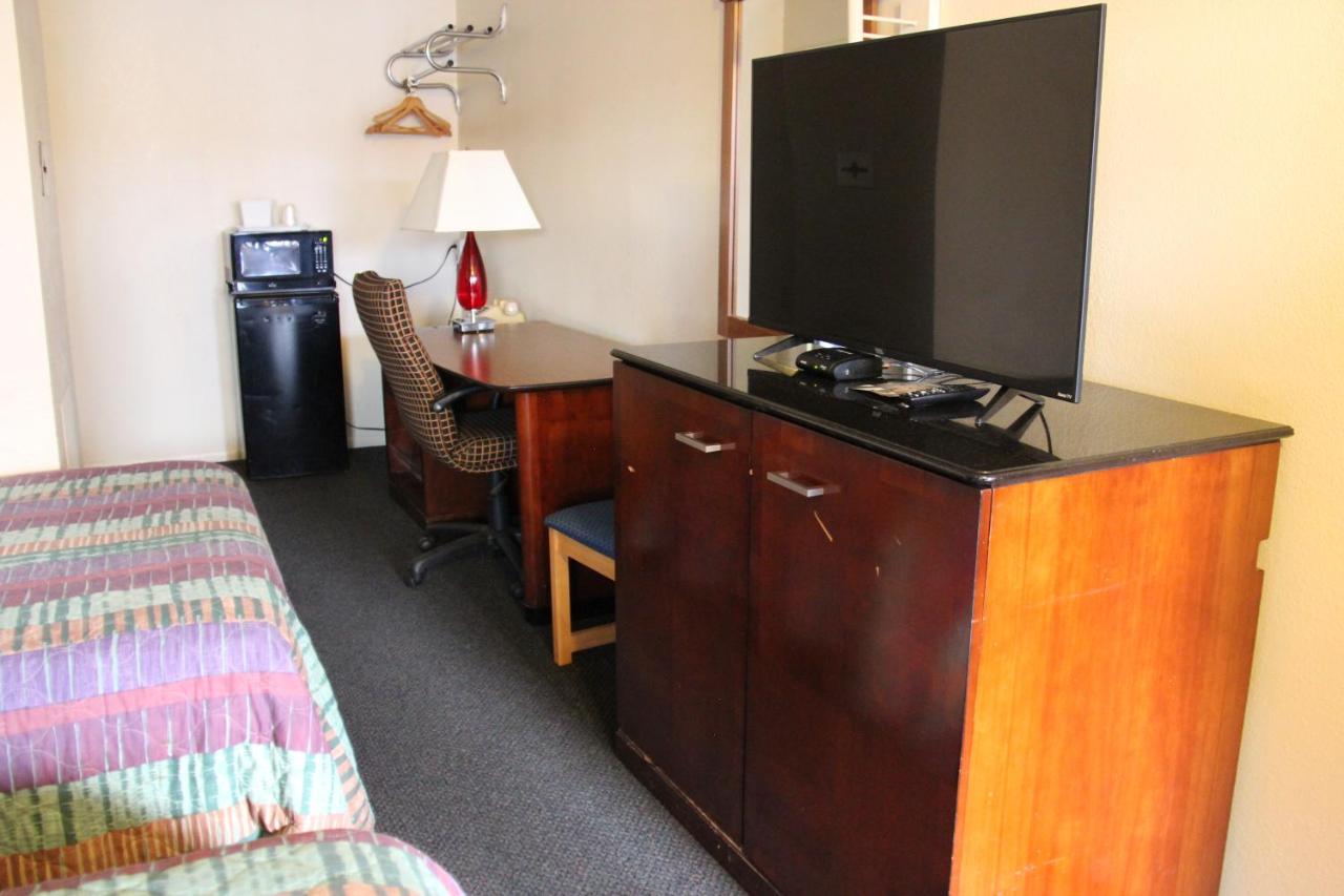 Guest room at El Dorado Inn Suites